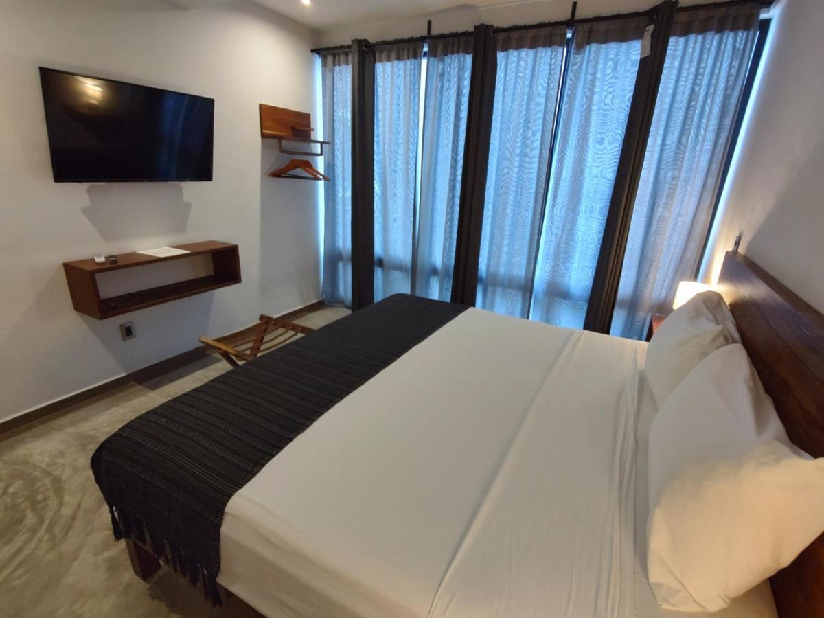 Hotel Muyu ตูลุม ภายนอก รูปภาพ