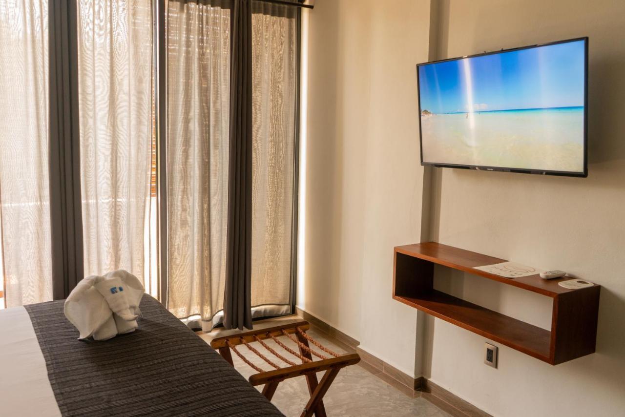 Hotel Muyu ตูลุม ภายนอก รูปภาพ