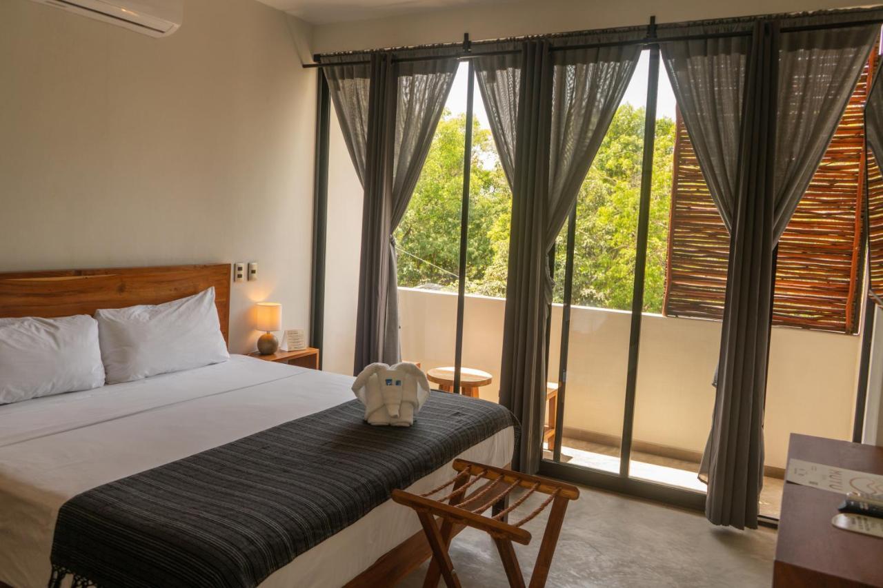 Hotel Muyu ตูลุม ภายนอก รูปภาพ