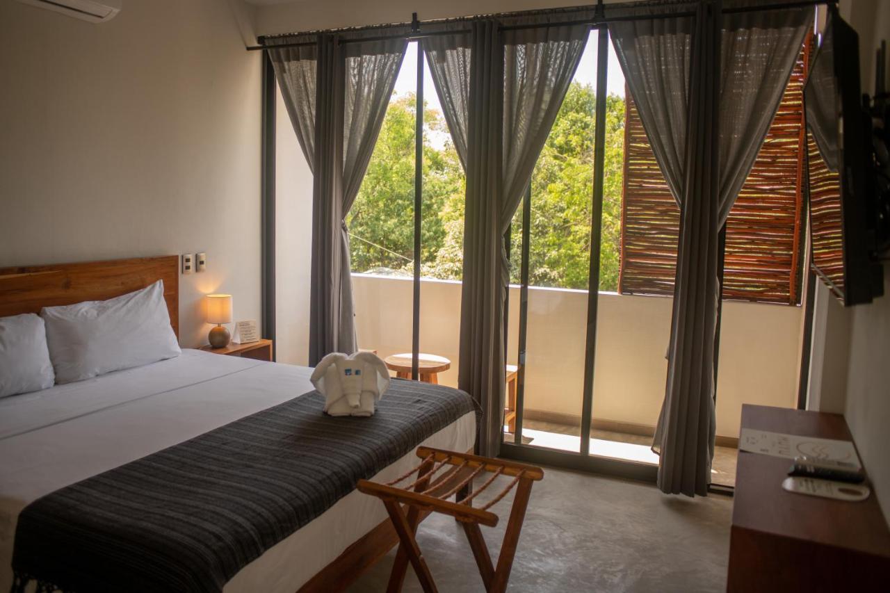 Hotel Muyu ตูลุม ภายนอก รูปภาพ