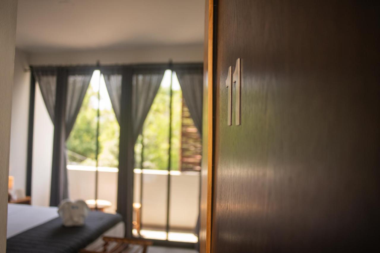Hotel Muyu ตูลุม ภายนอก รูปภาพ