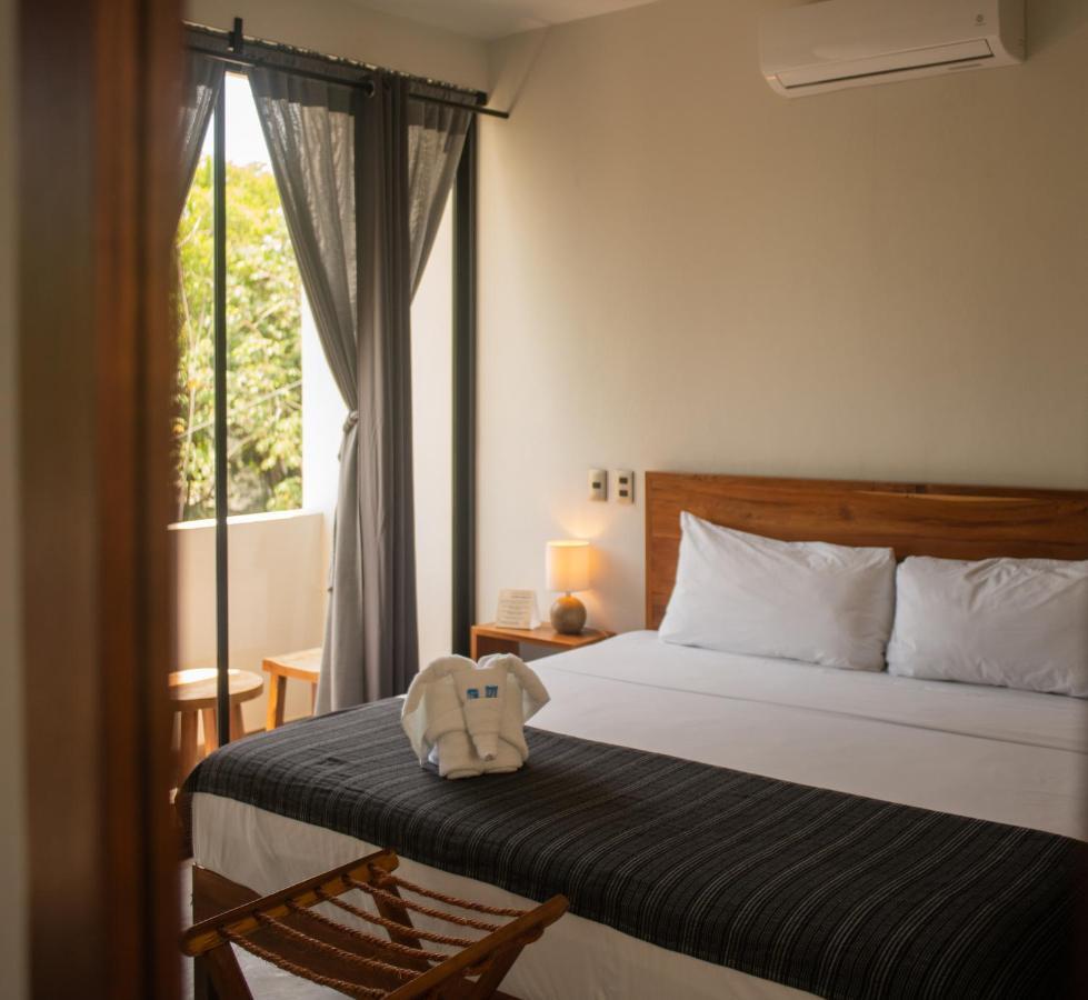 Hotel Muyu ตูลุม ภายนอก รูปภาพ
