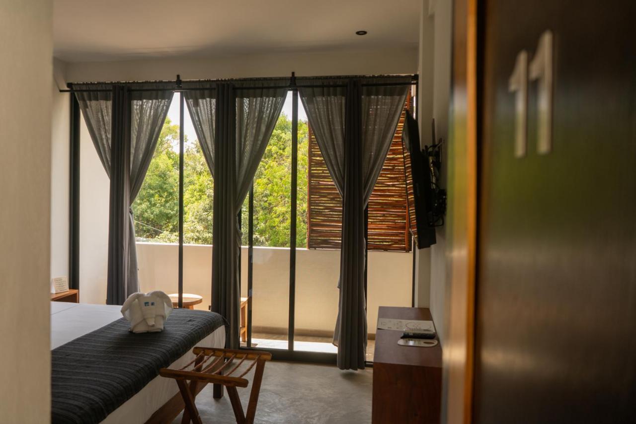 Hotel Muyu ตูลุม ภายนอก รูปภาพ