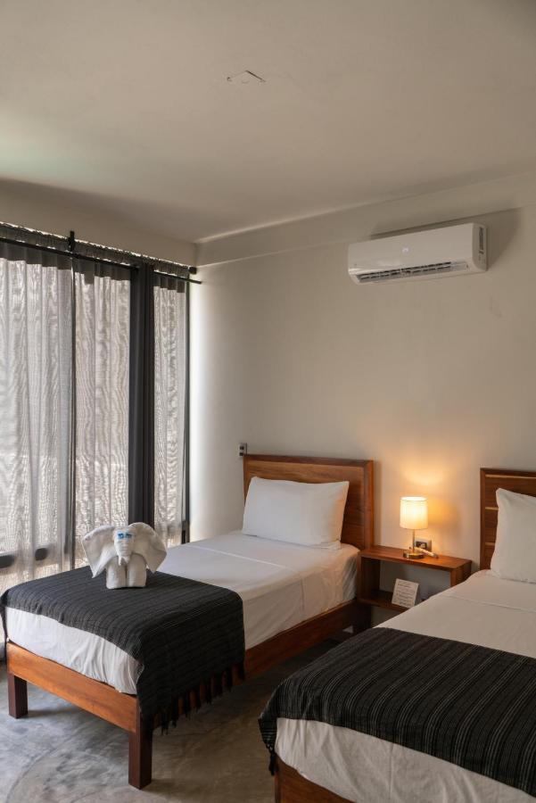 Hotel Muyu ตูลุม ภายนอก รูปภาพ