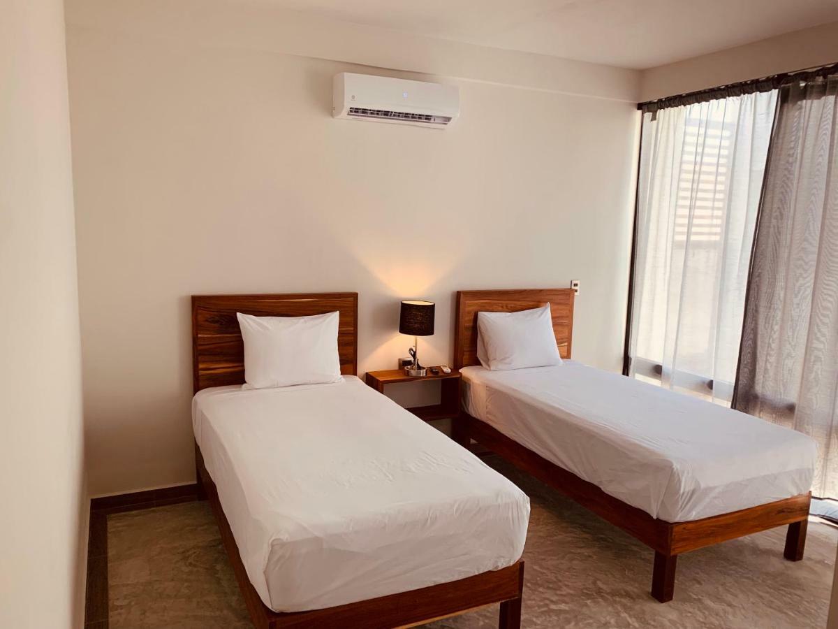 Hotel Muyu ตูลุม ภายนอก รูปภาพ